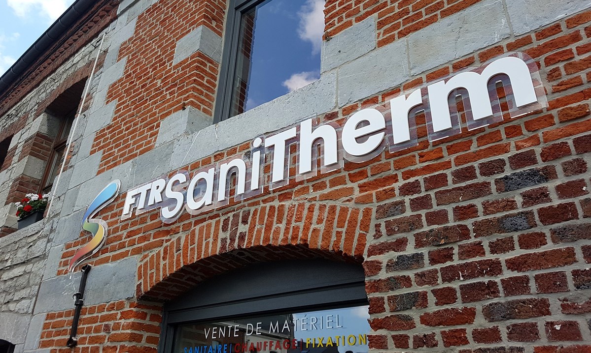 enseigne sanitherm magasin adn concept lettrage chimay
